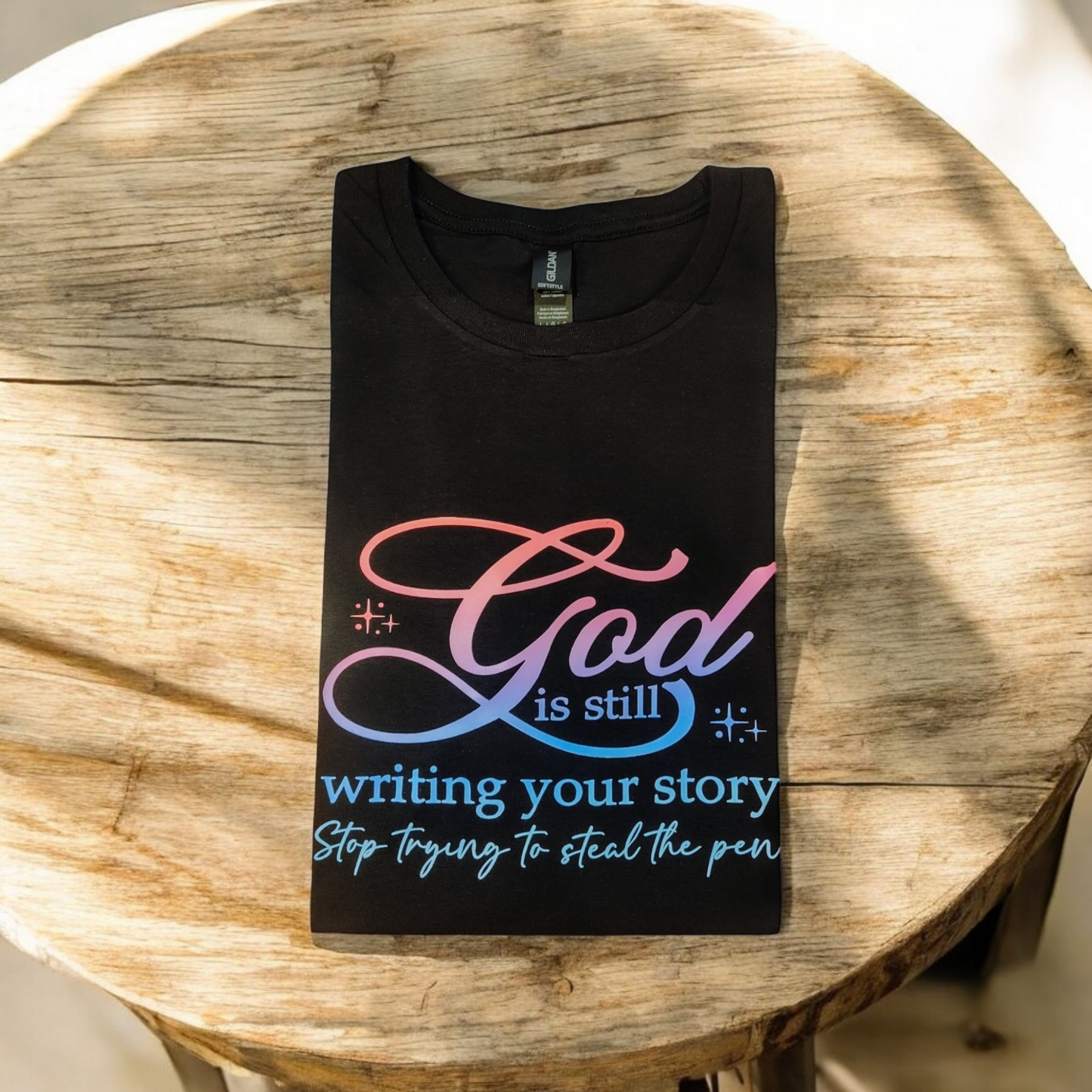 T-Shirt: "God Is Still Writing Your Story"